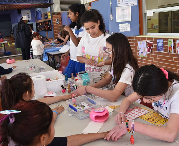 Students participating in the fun market day