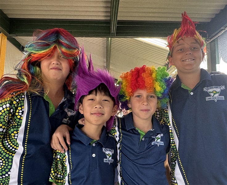 Four students with crazy coloured hair